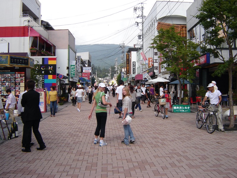 street with walking shoppers