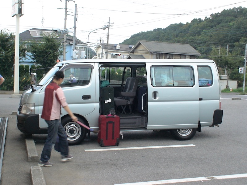 van in parking lot with open door