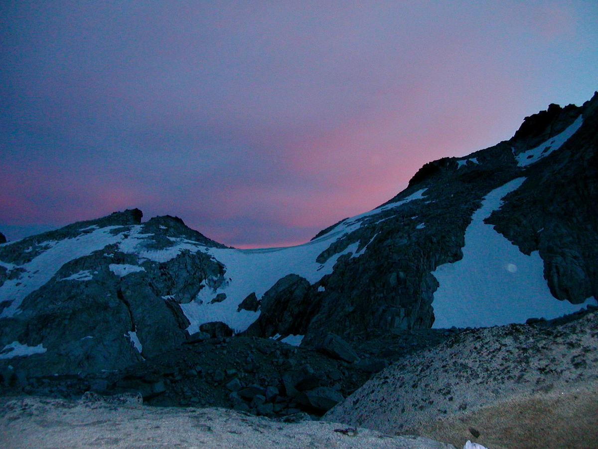 sunset beyond some peaks