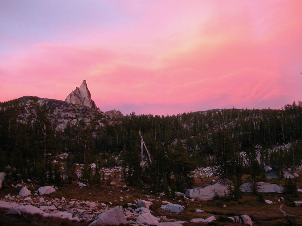 pink sky behind mountain