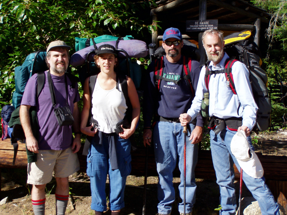 four hikers ready to go in