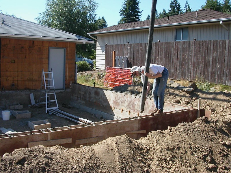 Larry directing pumped concrete