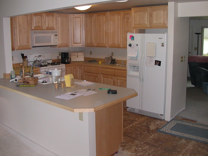 Kitchen with unfinished floor