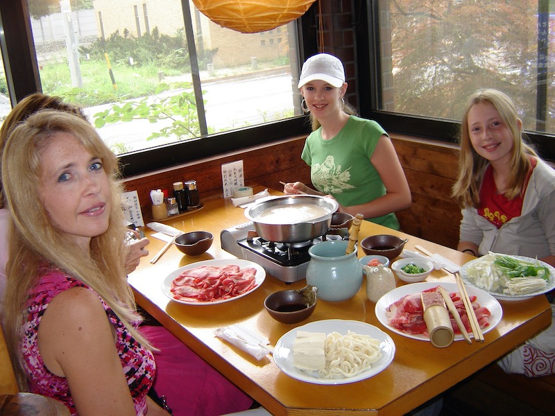 Lisa and her girls around table
