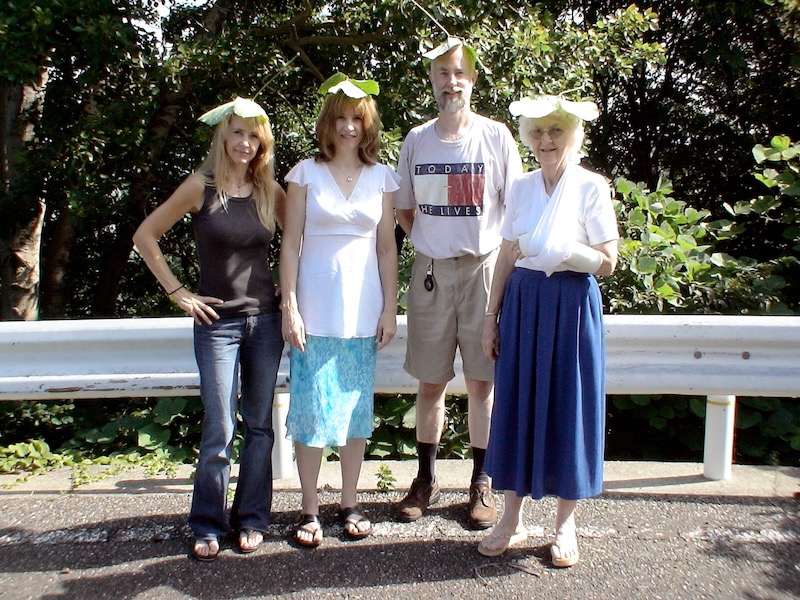 adults with big leafs on heads