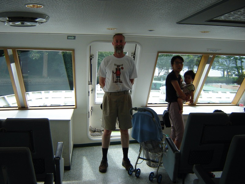 standing, with my head on boat ceiling