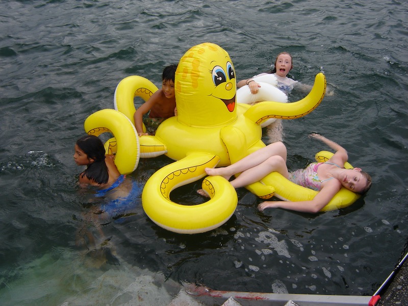 kids being attacked by octopus floaty