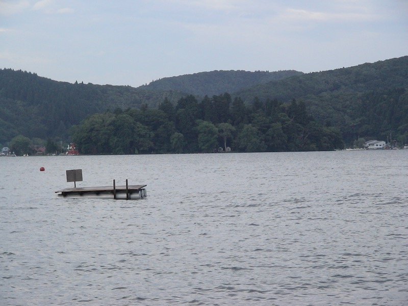 raft on lake with island beyond