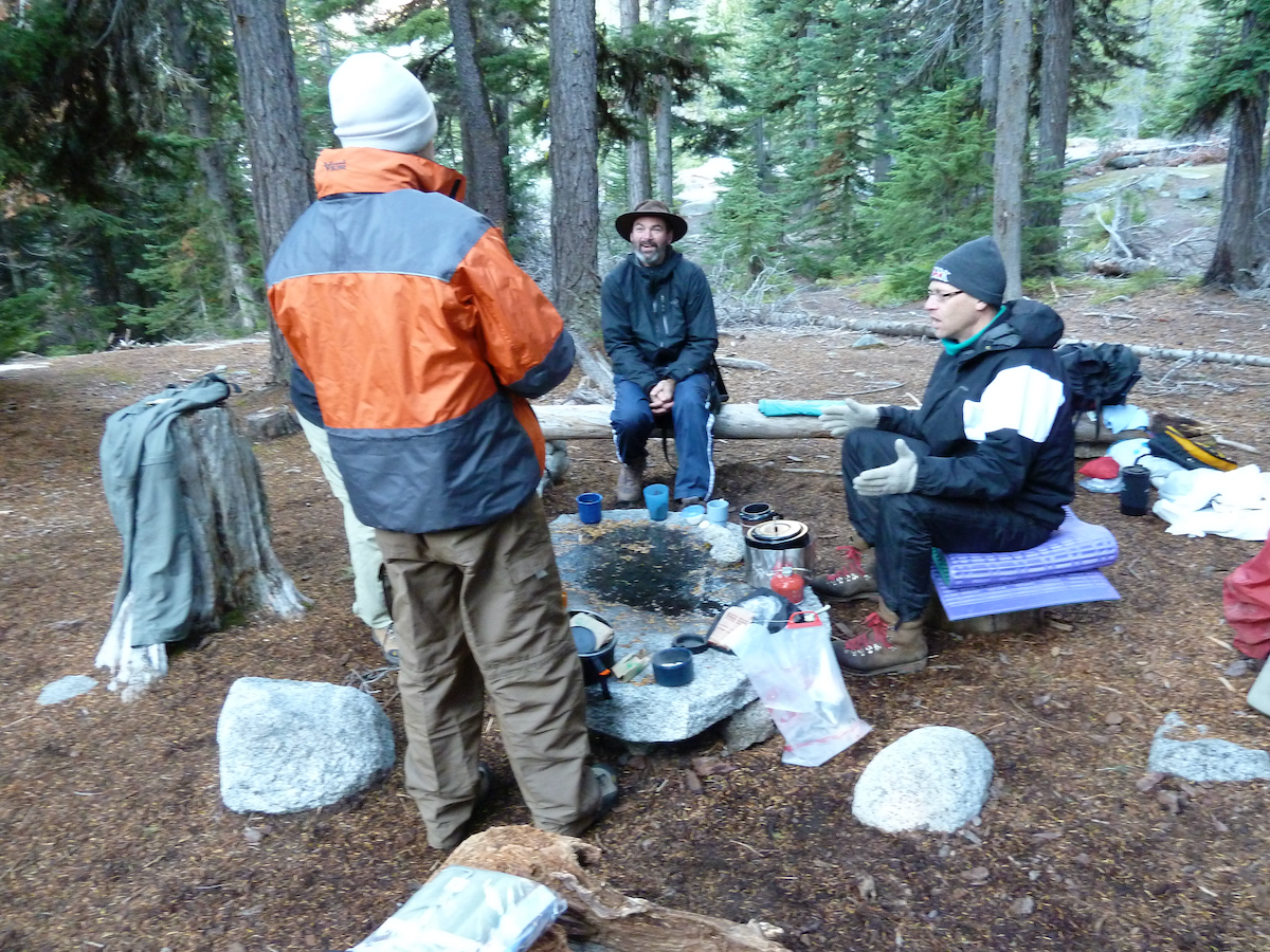 sitting around stoves bundled up