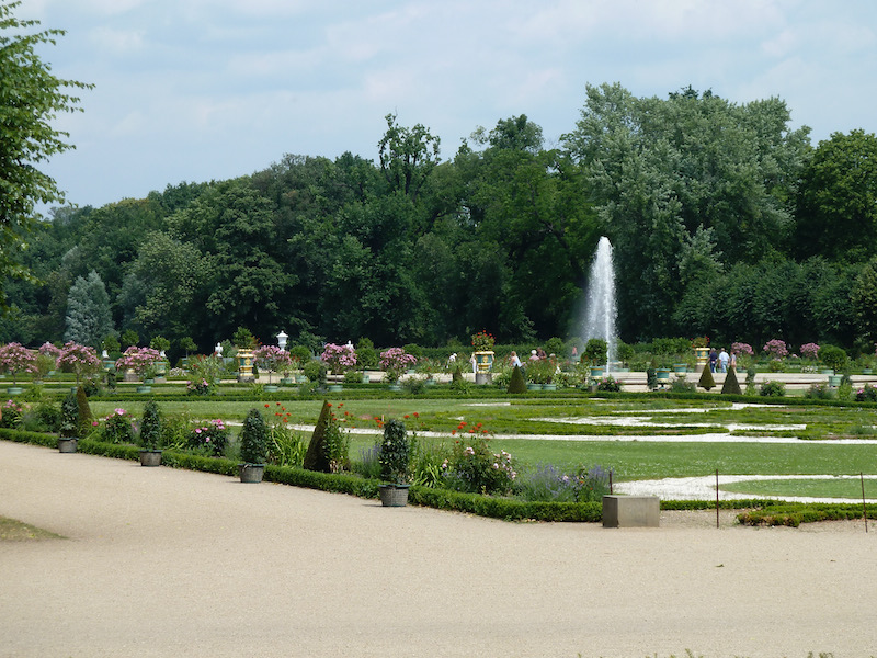 Green gardens with flowers and trees