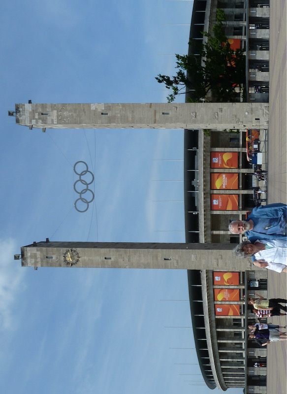 Stadium with Olympic rings between towers