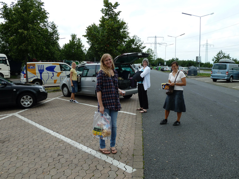 Standing by car