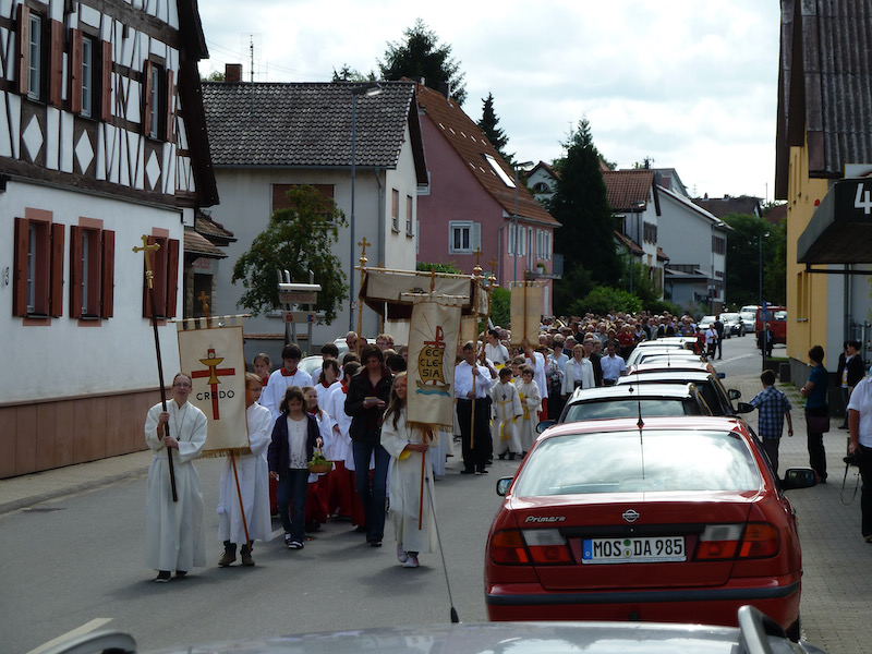 Church parade through a town