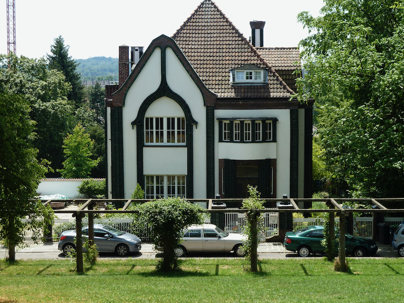 House with peaked arch motifs