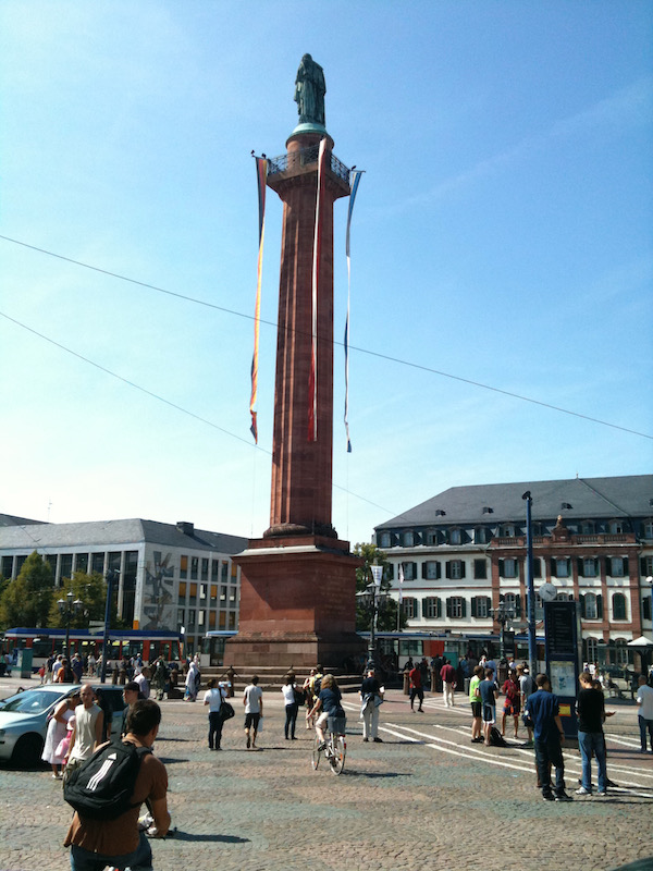 Tall stone column with statue