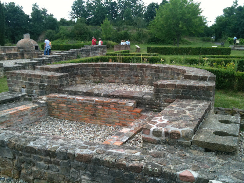 Low brick wall layout of ancient house site