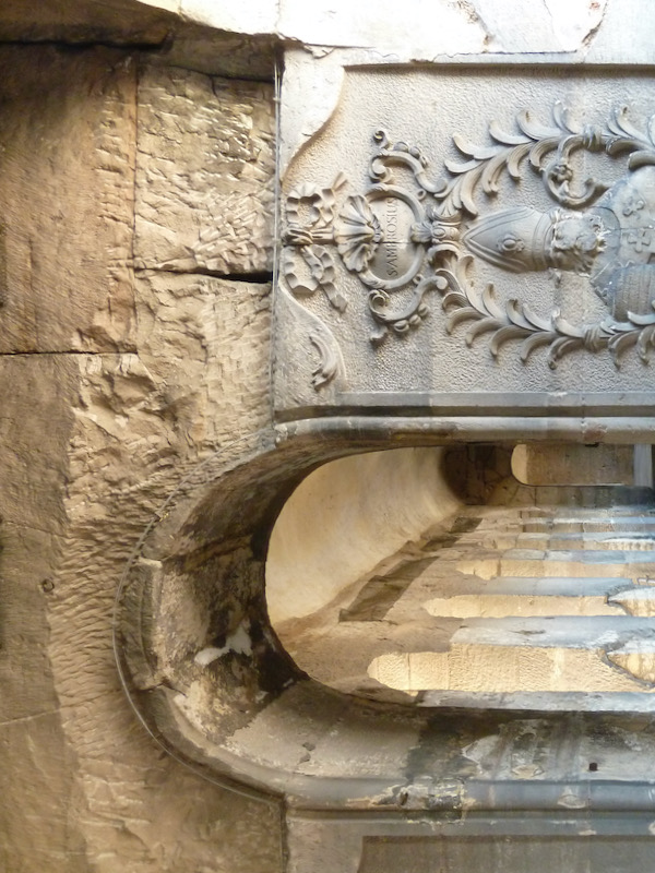 Hallway with relief of priest