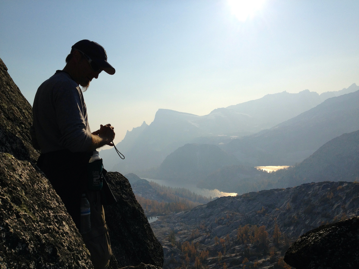 view toward Little Annapurna, lakes with hiker in foreground