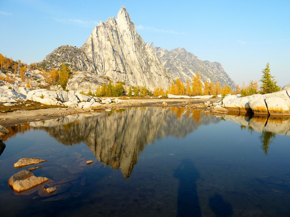 Prusik reflected in a local tarn