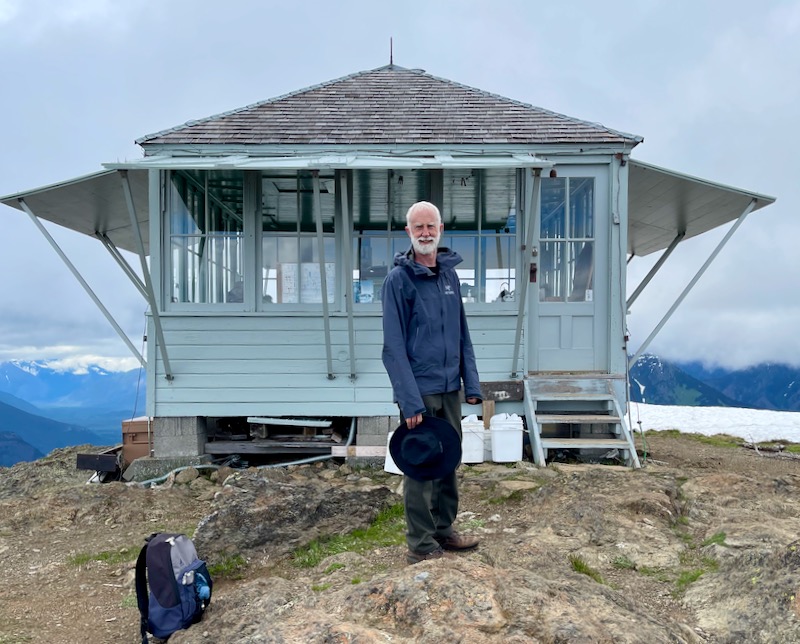 Larry posing in front of lookout