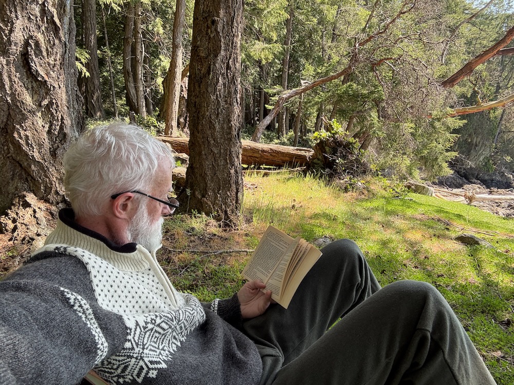 seated reader with book