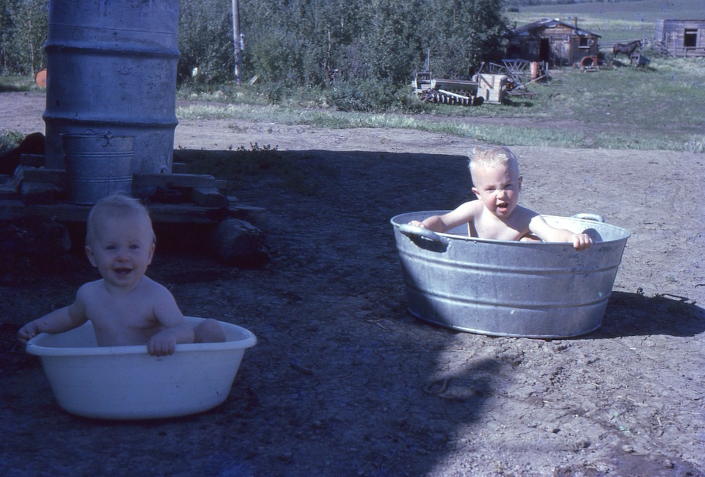 Marilyn and Larry outside in tubs
