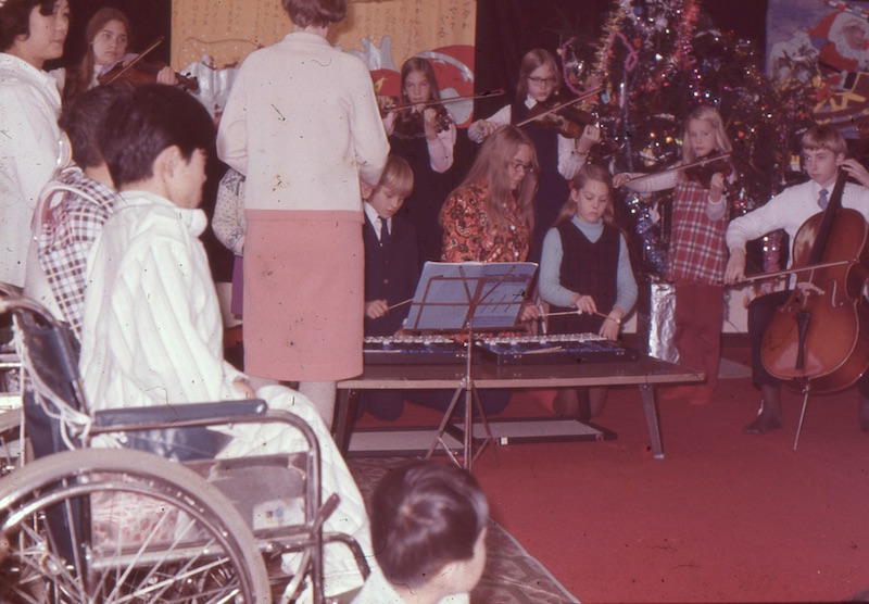 Performing as a group at home for disabled