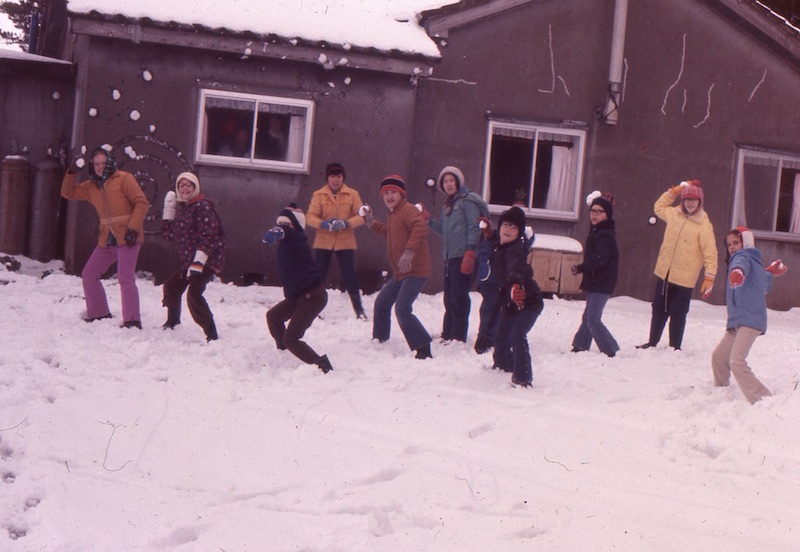 Kids throwing snowballs at the camera