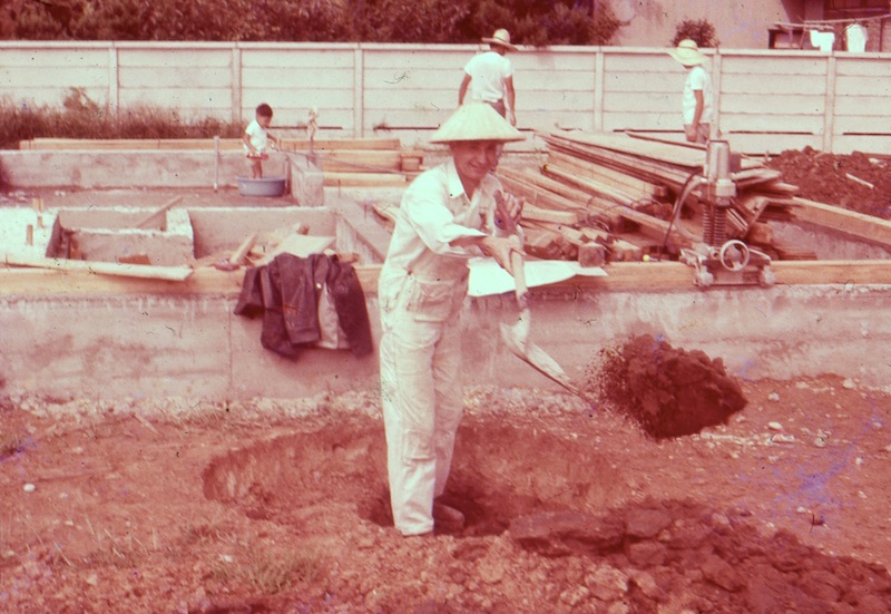 Leslie digging a septic tank hole for church