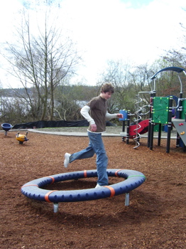 Andrew running on Merry-go-round